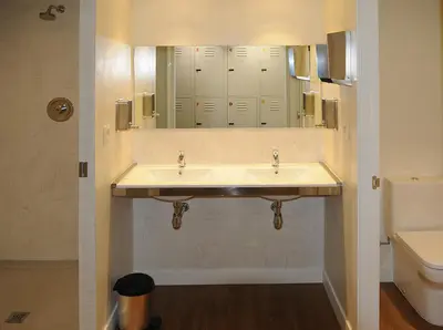 a room with two bunk beds in a room at Albergue Guiana in Ponferrada