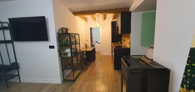 a room with a kitchen and a living room at El Sueño in Barres