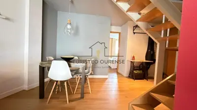 a room with a staircase with a glass case at Calpurnia Casco Viejo in Ourense