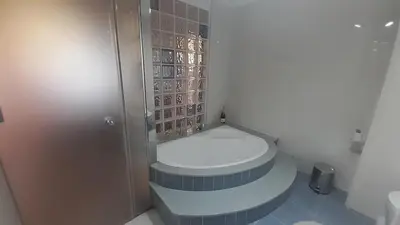 a bathroom with a toilet and a shower at Ameli House By PECA in Silleda