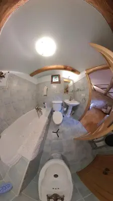 a bathroom with a tub and a toilet and a sink at Private Entire Home ,Old Town 6-min Walk to Cathedral in Santiago de Compostela
