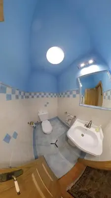 a bathroom with a sink and a toilet and a mirror at Private Entire Home ,Old Town 6-min Walk to Cathedral in Santiago de Compostela
