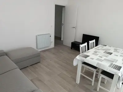 a living room with a couch and a table at Vivienda Ares Centro in Ares