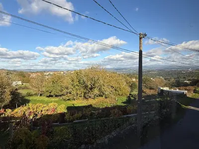 a view of a road with a utility pole at YourHouse Casa Antonio in Amoeiro