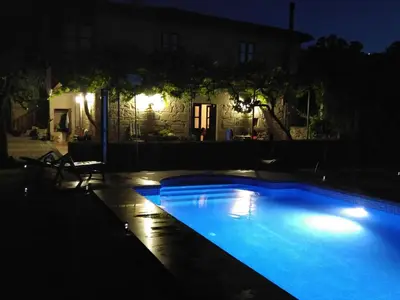 a swimming pool in a yard at night at Holiday Home mit Privatpool by Interhome in Parada del Sil