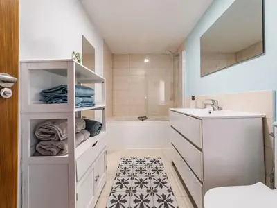 a white bathroom with a sink and a shower at Holiday Home Galicia Retreat by Interhome in Cerdedo