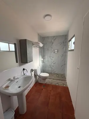 a bathroom with a sink and a toilet at Torkes in Foz