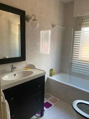 a bathroom with a sink and a tub and a toilet at Barreiros in Barreiros