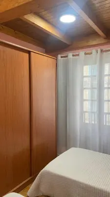 a bedroom with a bed and a window at Nido 33 in Ribadeo
