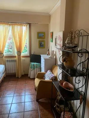 a living room with a couch and a table at Lar do Pero - Ribeira Sacra