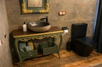 a bathroom with a sink on top of a table at Winahost Apartamento Neipin in Neipín