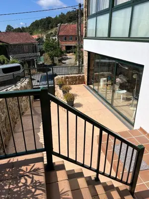 a view from a balcony of a building at Alojamientos as moras arans in La Cañiza