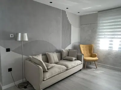 a living room with a couch and a chair at VUT La CEPEDA in Astorga