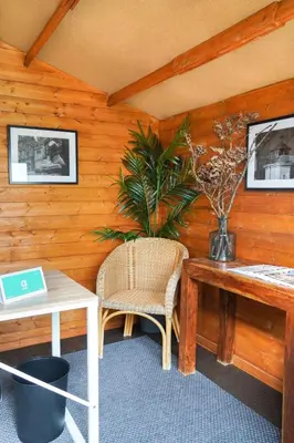 a room with a table and a chair and a desk at Alda Palas de Rei in Palas de Rei