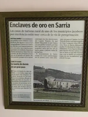 a paper with a picture of a house at Pazo Torre Do Barrio in Loseiro