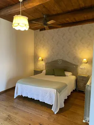 a bedroom with a large bed in a room at La Casa Grande Del Valle in El Valle