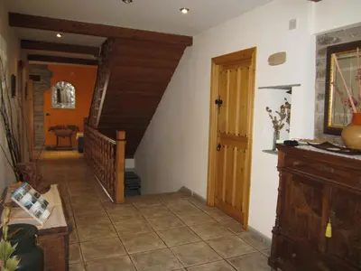 a hallway with a staircase in a house at A Lareira in Chan de Vilar