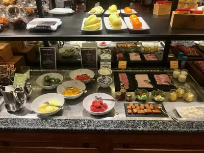 a buffet line with many different types of food at Parador de Ribadeo in Ribadeo