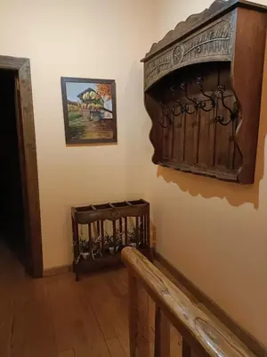 a room with a wooden cabinet on the wall at Casa do Eiró in Lago de Carucedo