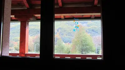 a window with a view of a mountain view at Apartamentos Turísticos Cabrera in Tejedo de Ancares