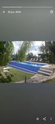 a picture of a swimming pool in a park at Casa da Xeitosa in Barbudo