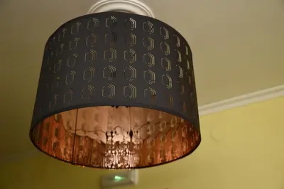 a black lamp hanging from a ceiling at Hotel Villa De Ribadeo in Ribadeo