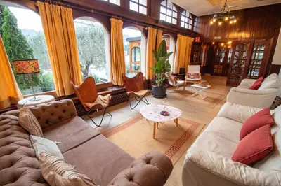 a living room with a couch and a table at Hotel Montero in Mondoñedo