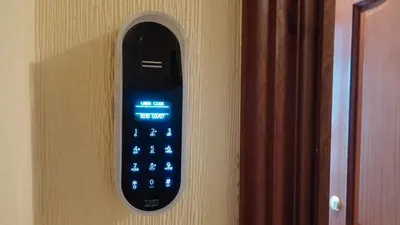 a remote control is hanging on a wall at Descanso Termal in Ourense