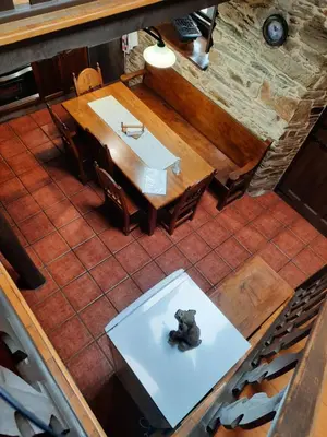 an overhead view of a dining room with a table and a teddy bear at Casa Viduedo in Santa Eulalia de Oscos