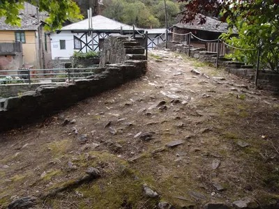a dirt road with a bunch of rocks on it at Albergue Casa del Pescador in Ambasmestas