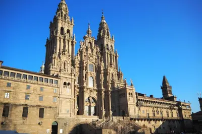 a large building with two towers on top of it at A Fonte das Hortas Residencial in Santiago de Compostela