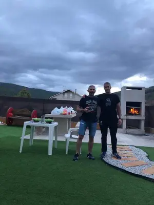 two men standing next to each other in front of a fireplace at Casa Blanco Conde in Laza