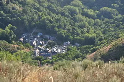 a group of houses in the middle of a hill at Casa de Abril 1 in San Cristóbal de Valdueza