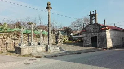 an old stone church with crosses on the side of the road at Casa Cruceiro in Barcela