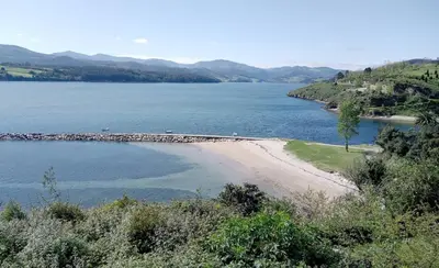 an island in the middle of a large body of water at Hostal Ponte Dos Santos in Ribadeo