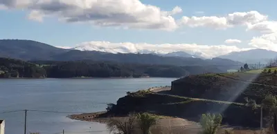 a view of a river with mountains in the background at Hostal Ponte Dos Santos in Ribadeo