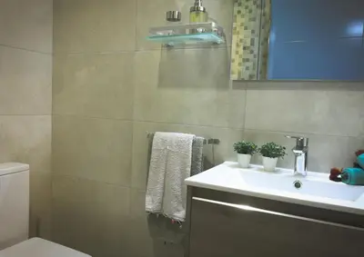 a bathroom with a sink and a toilet at Casa Do Medio in Santiago de Compostela