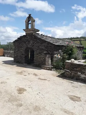 an old stone building with a bell tower at Casa Quiroga in Lamas