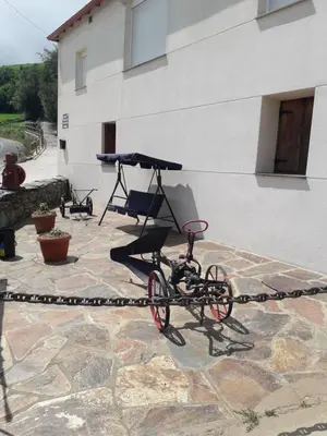 a bike parked in front of a building at Casa Quiroga in Lamas