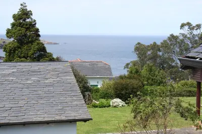 a view of the ocean from a house at Casa Tésera in El Franco