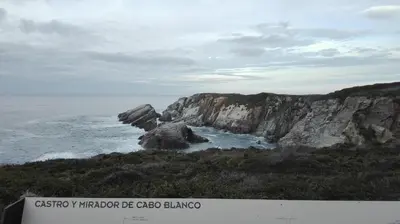 a view of the ocean and a rocky coastline at Casa Tésera in El Franco