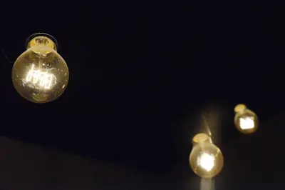 a group of three lights in the dark at Casa Rural Pico del Lugar in Villar de los Barrios