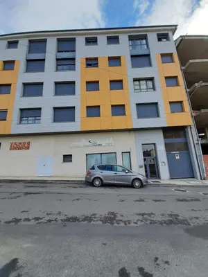 a car parked in front of a building at Lugomar in Foz