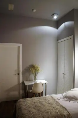 a bedroom with a bed and a table with a chair at Casa Amando in Somozas