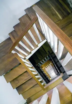 an overhead view of a wooden staircase with wood floors at Numa Rúa Travesa in Santiago de Compostela