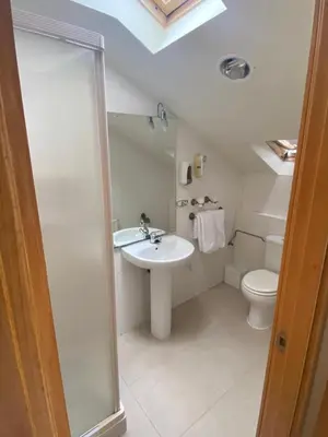 a bathroom with a sink and a toilet at Hotel Metropol by Carris in Lugo