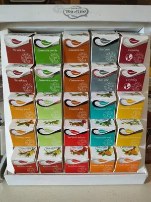 a display of boxes of food on a shelf at Hotel Pazo de Berbetoros in Portomarin