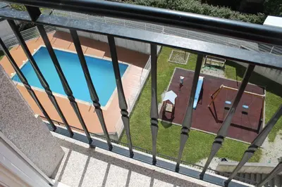 a view of a swimming pool from a balcony at Viveiro in Viveiro