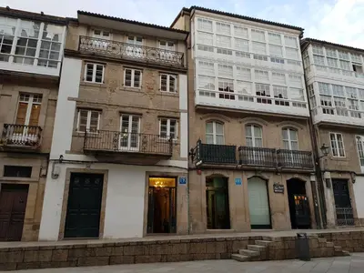 a row of tall buildings in a city at PICO SACRO II HOTEL Santiago de Compostela in Santiago de Compostela