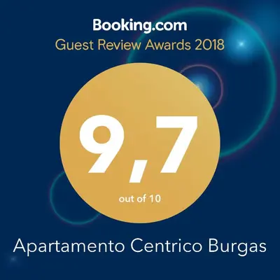 a sign that reads quest review awards with a yellow circle at Céntrico Burgas Termal in Ourense